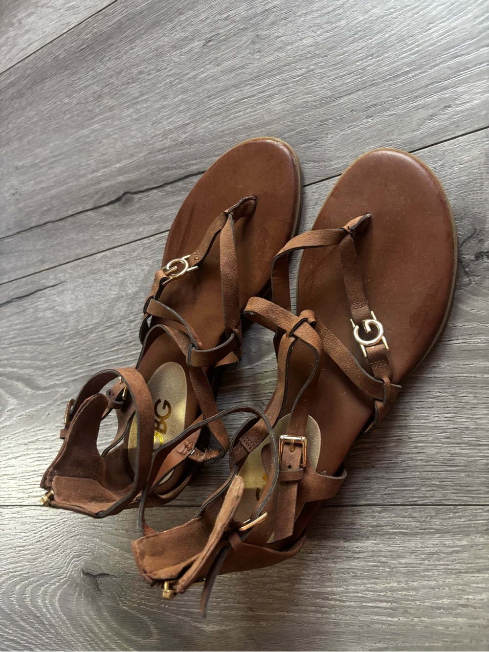 G by Guess Brown Strappy Gladiator Sandals with Gold Hardware
